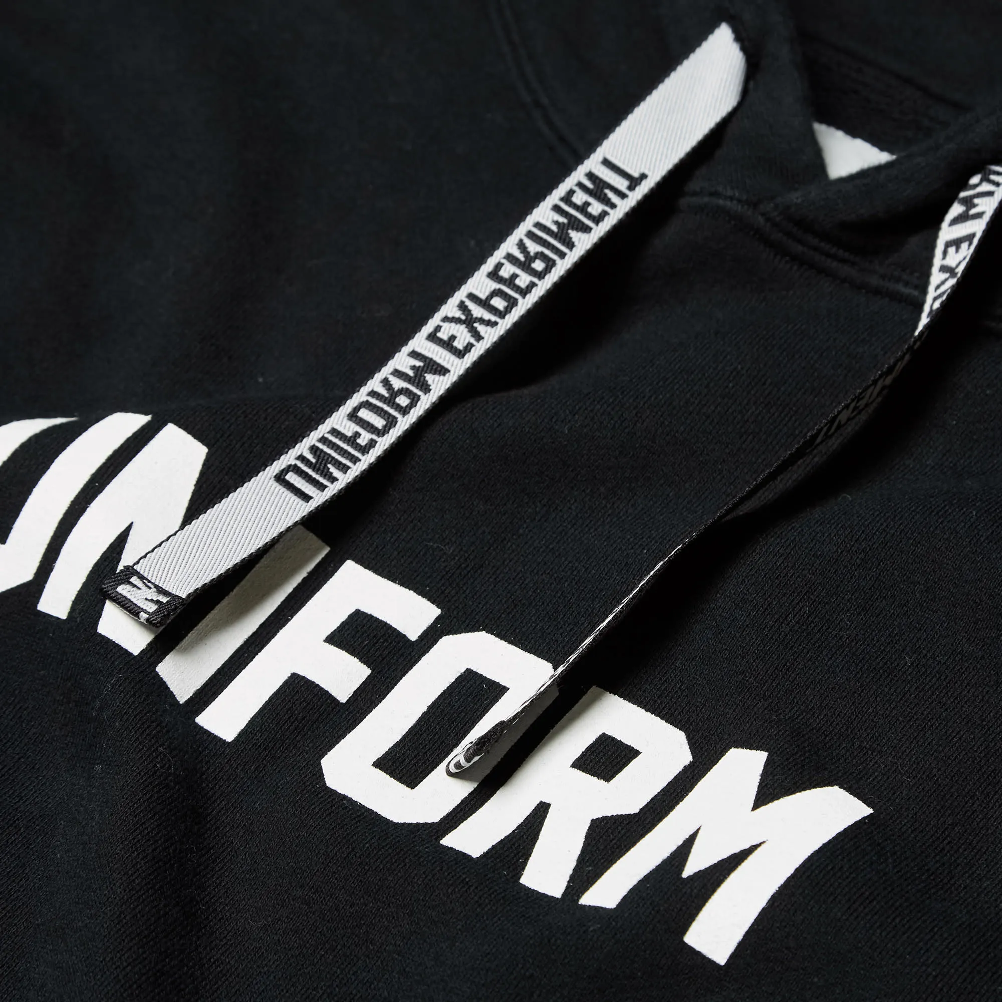 Uniform Experiment Dripping Logo HoodyBlack